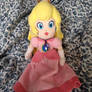 Peach wearing her necklace