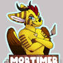 (COM) Mort badge