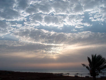 Sun bursting at the beach 1