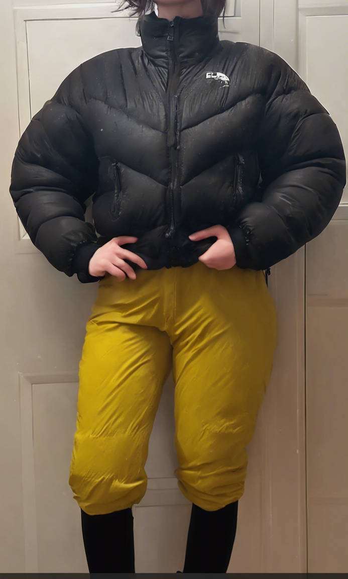 Oversized black puffer and yellow ski pants by ashleycurzonmuir on
