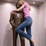 hugging the statue of the worlds Tallest