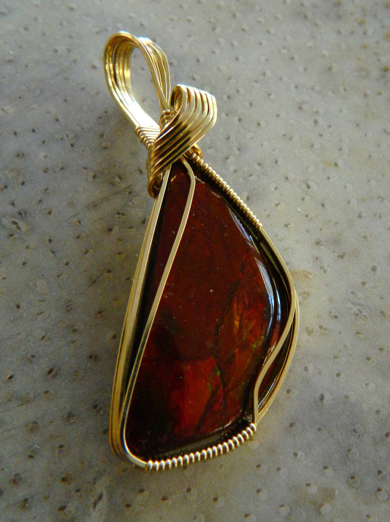Fossil on fossil by DPBJewelry