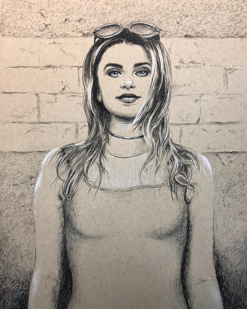 Portrait against wall in charcoal pencil