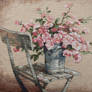 Roses on a white chair