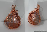 Juxtapose wire-wrapped pendant by Animus-Panthera