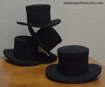 Custom decorated mini top hats by Animus-Panthera