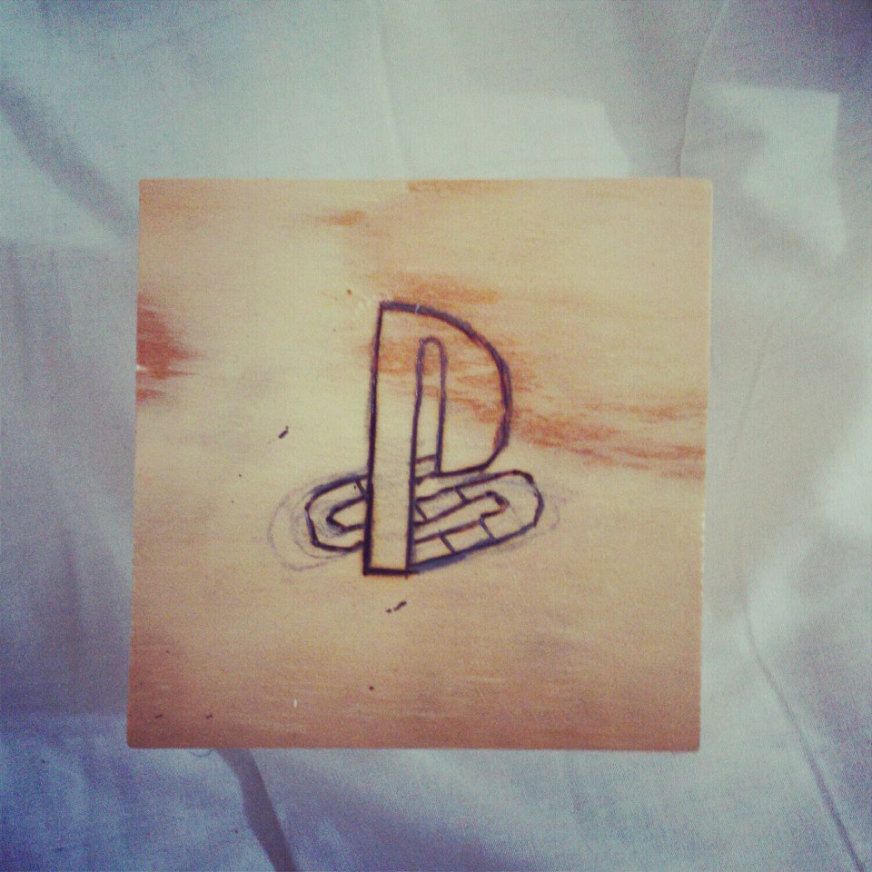 Woodburned playstation box