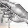 Hand Clutching Rosary