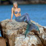 Mermaid on rocks