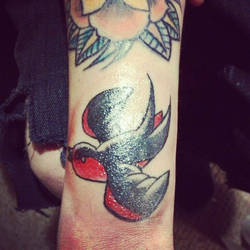 Swallow tattoo