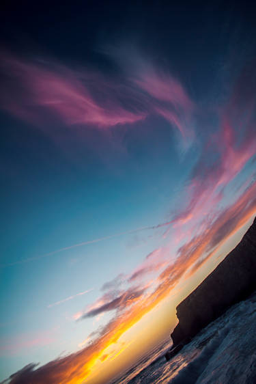 Wispy clouds at sunset