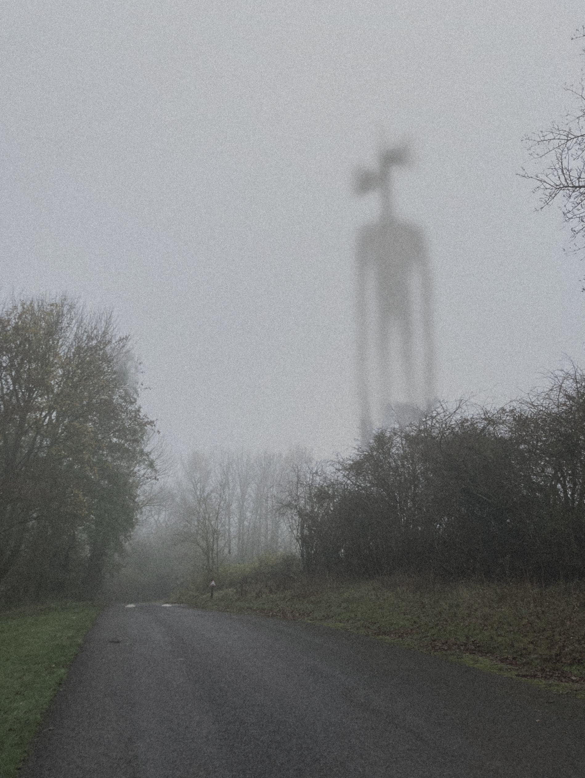 prompthunt: giant siren head, scary, creepy, foggy background