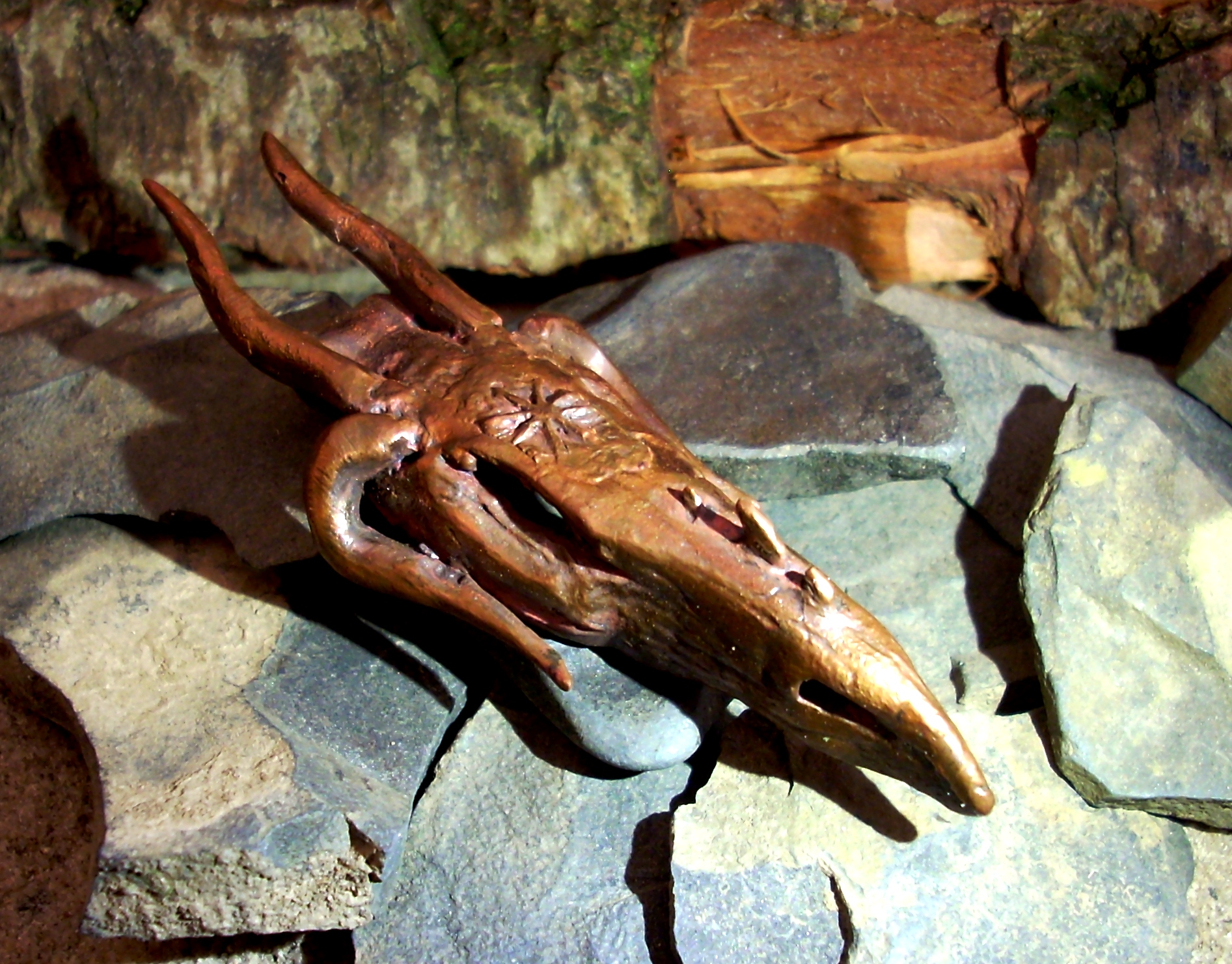 Copper dragons head pendant