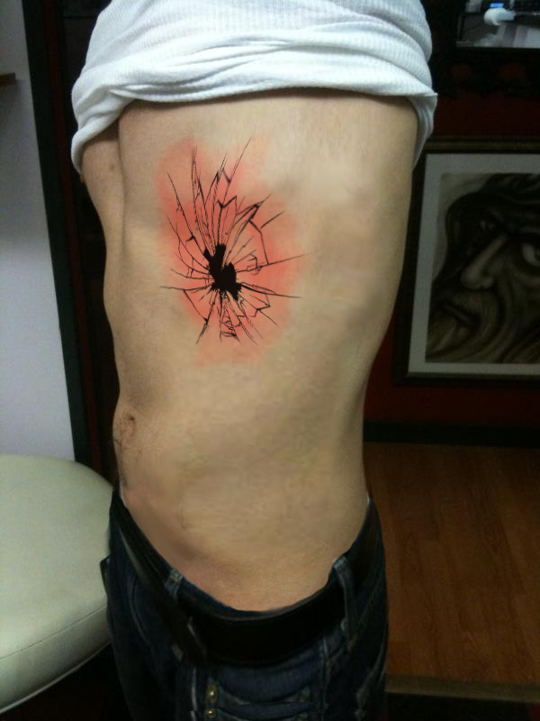 glass bullet hole tattoo