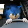 Sonic driving a car