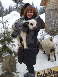 my wife with small sheep baby