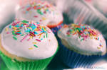 Rainbow sprinkles Cupcakes by Happysmitten