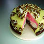 sliced yellow cake with pink