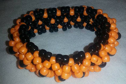 Orange and black kandi cuff bracelet