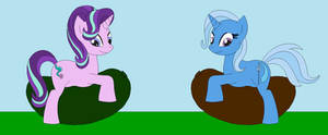 Starlight Glimmer and Trixie riding on balloons