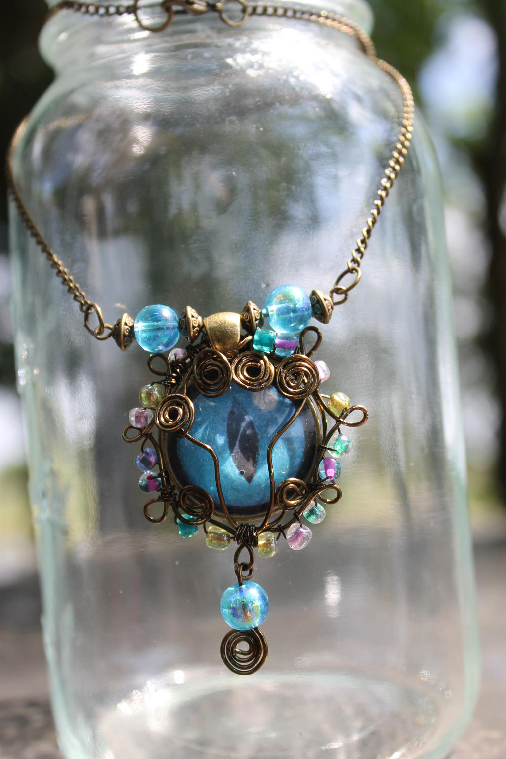 Blue Glow Wire Wrapped Dragon Eye Necklace