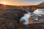 Kolufoss Sunset Waterfall by boldfrontiers