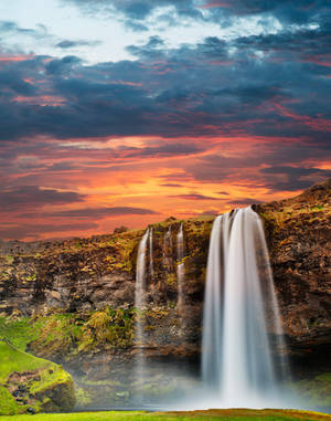 Vibrant Seljalandsfoss Sunset by boldfrontiers