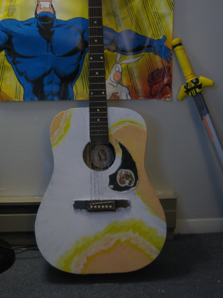 painting a guitar -oranges-