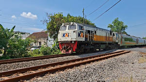 Sancaka Afternoon Train Crossing At PJL Mastrip