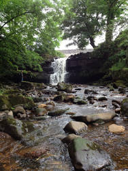 Low down distanced waterfall.