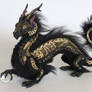 Black and Gold Orb Dragon
