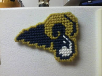 Plastic canvas St. Louis Rams logo magnet.