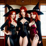 Three redhead sisters in sexy witch costumes