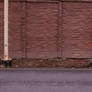Textured Brick Wall with Pole