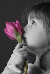 A child with a tulip