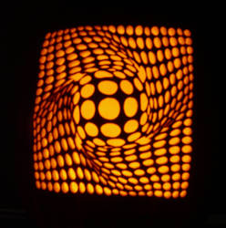 optical illusion hand-carved on a foam pumpkin