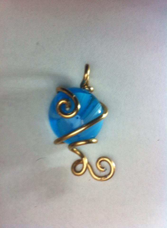 teal and gold pendant