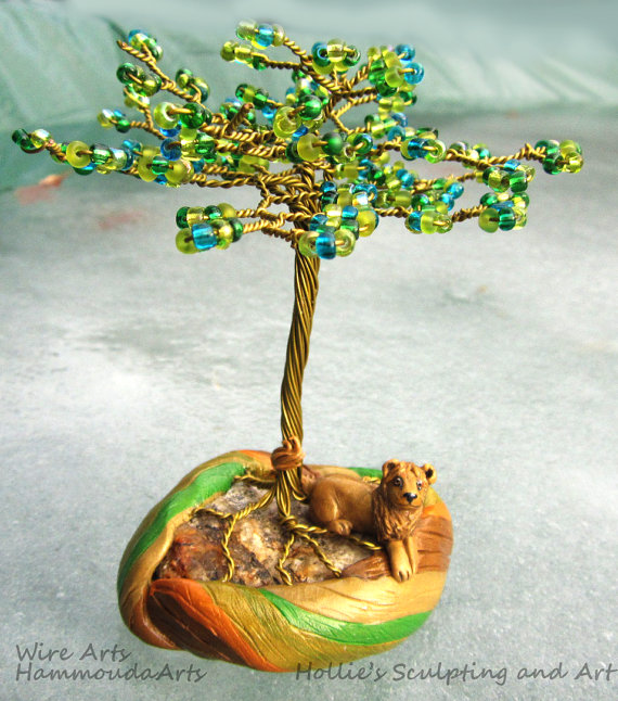 Lion tree of life sculpture