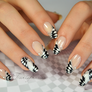Checkerboard nail art optical illusion