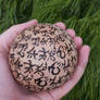 Warded wood burning ball