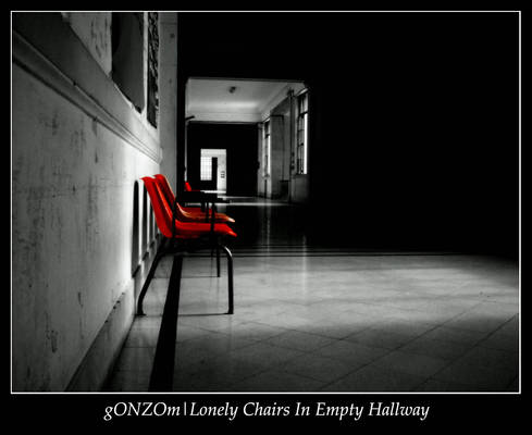 Lonely Chairs In Empty Hallway