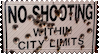 a sign that says 'no shooting within city limits' that is covered in bullet holes