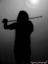 Violinist in the dark.