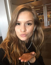 Josephine Skriver hypnotized by her earpieces  