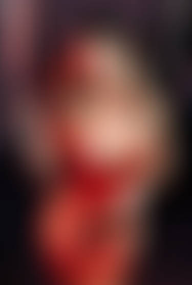 Sexy dominatrix holding a whip