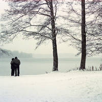 two snowy couples