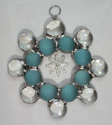 Glass snowflake with snowflake charm