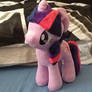 Twilight Plushie behind the pillows