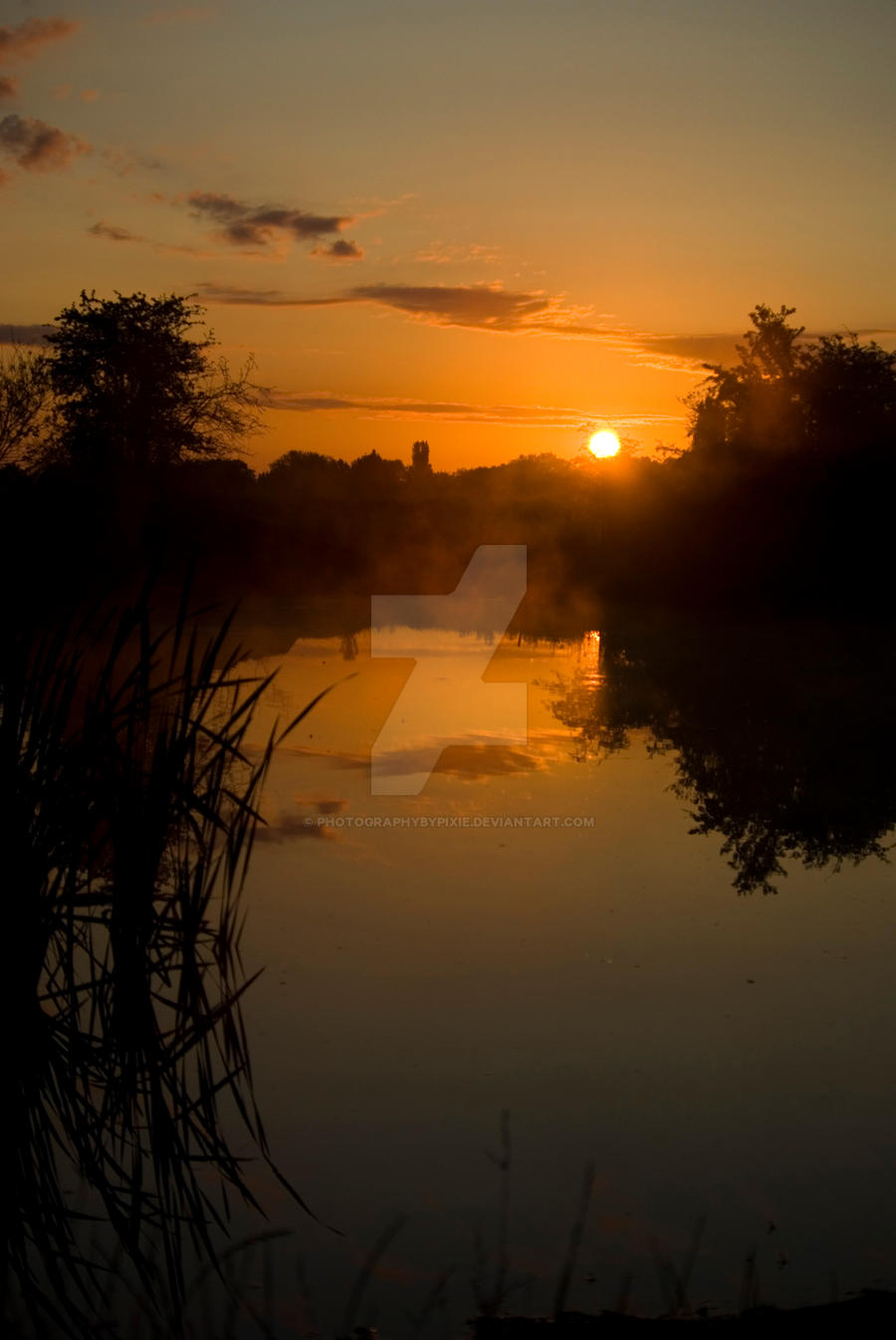 sunrise by a lake