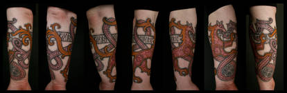 Nordic griffin and worm tattoo